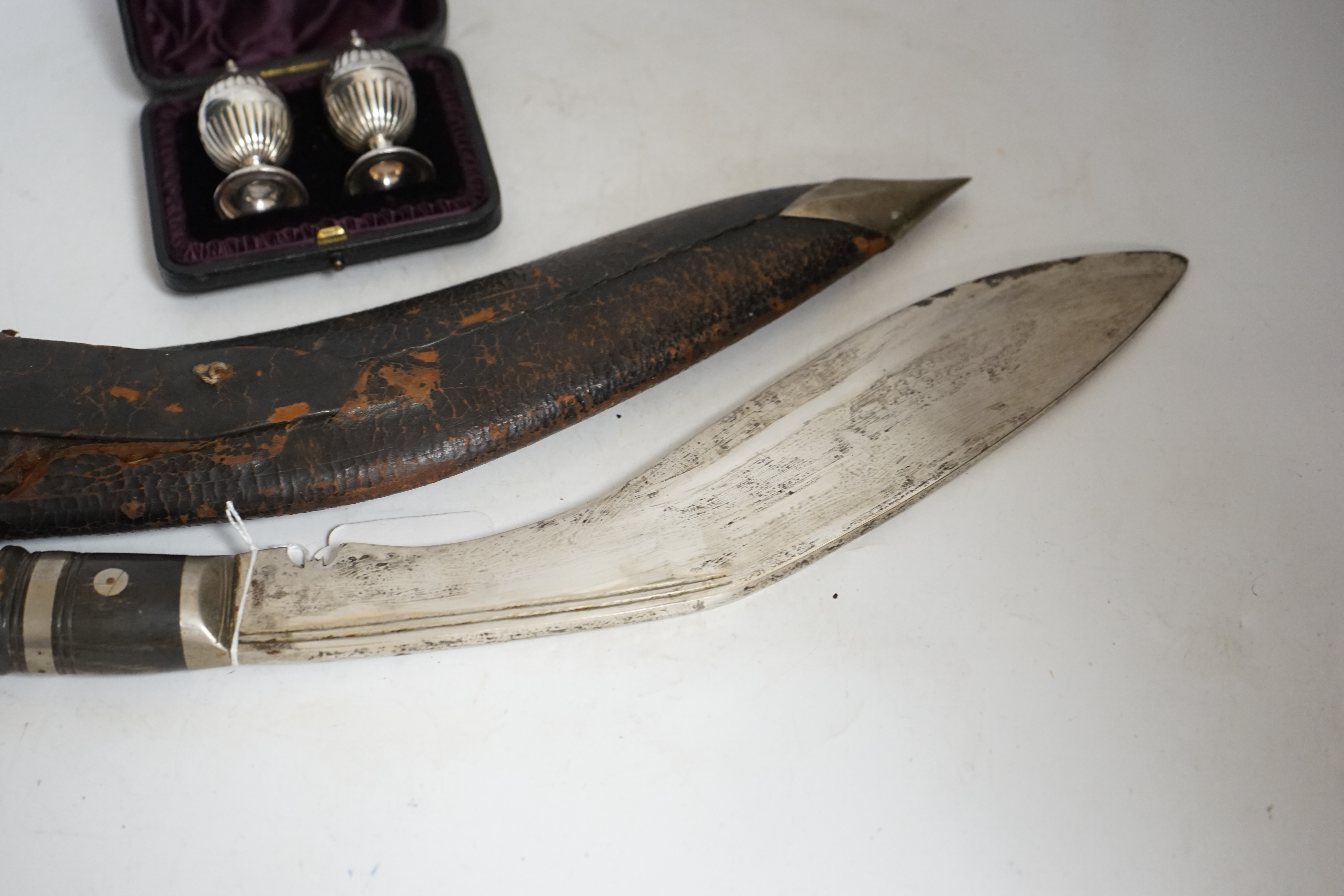 A Kukri and pair of silver peppers